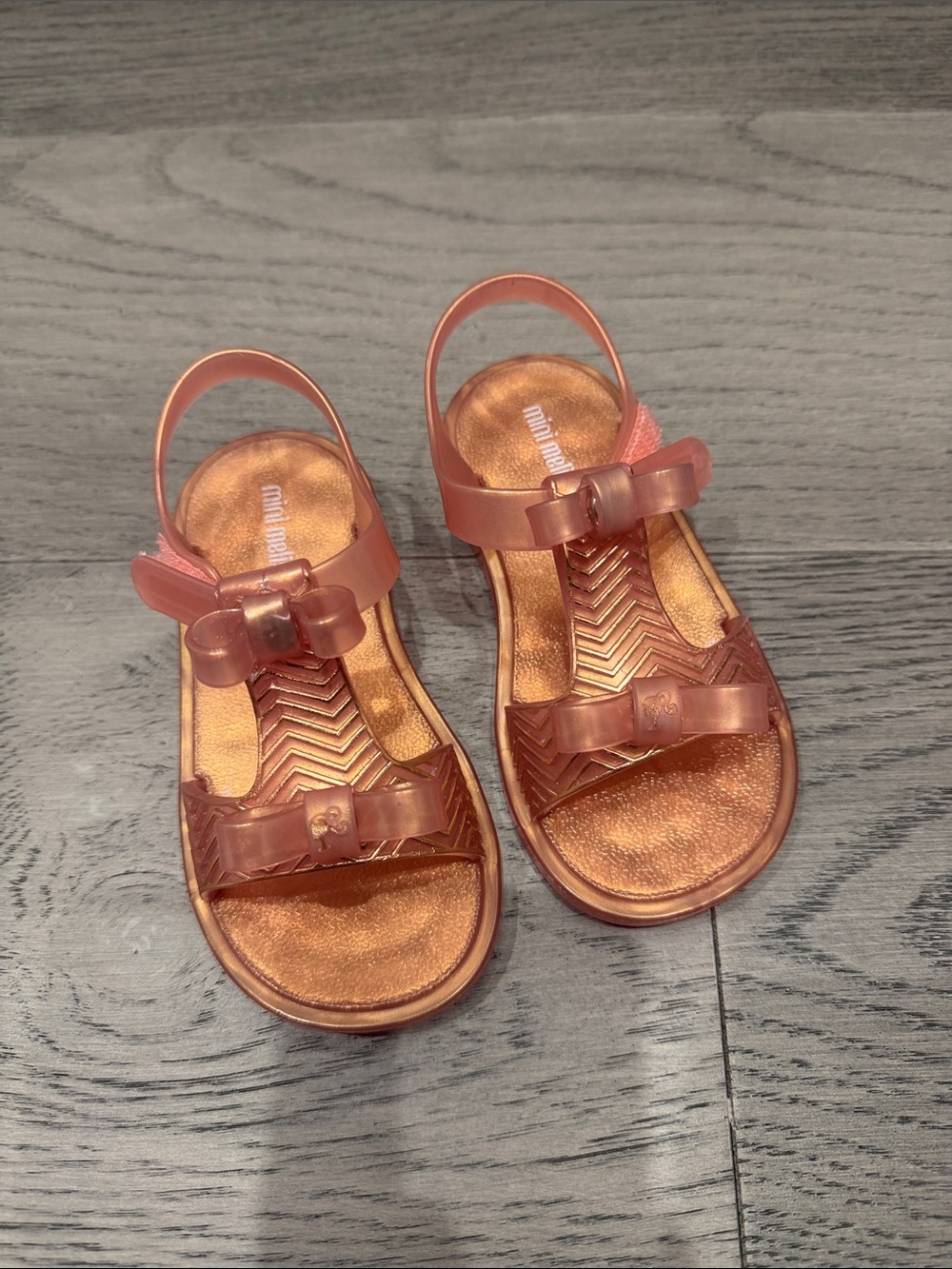 Mini Melissa Rose Gold Jelly Sandals with Bows